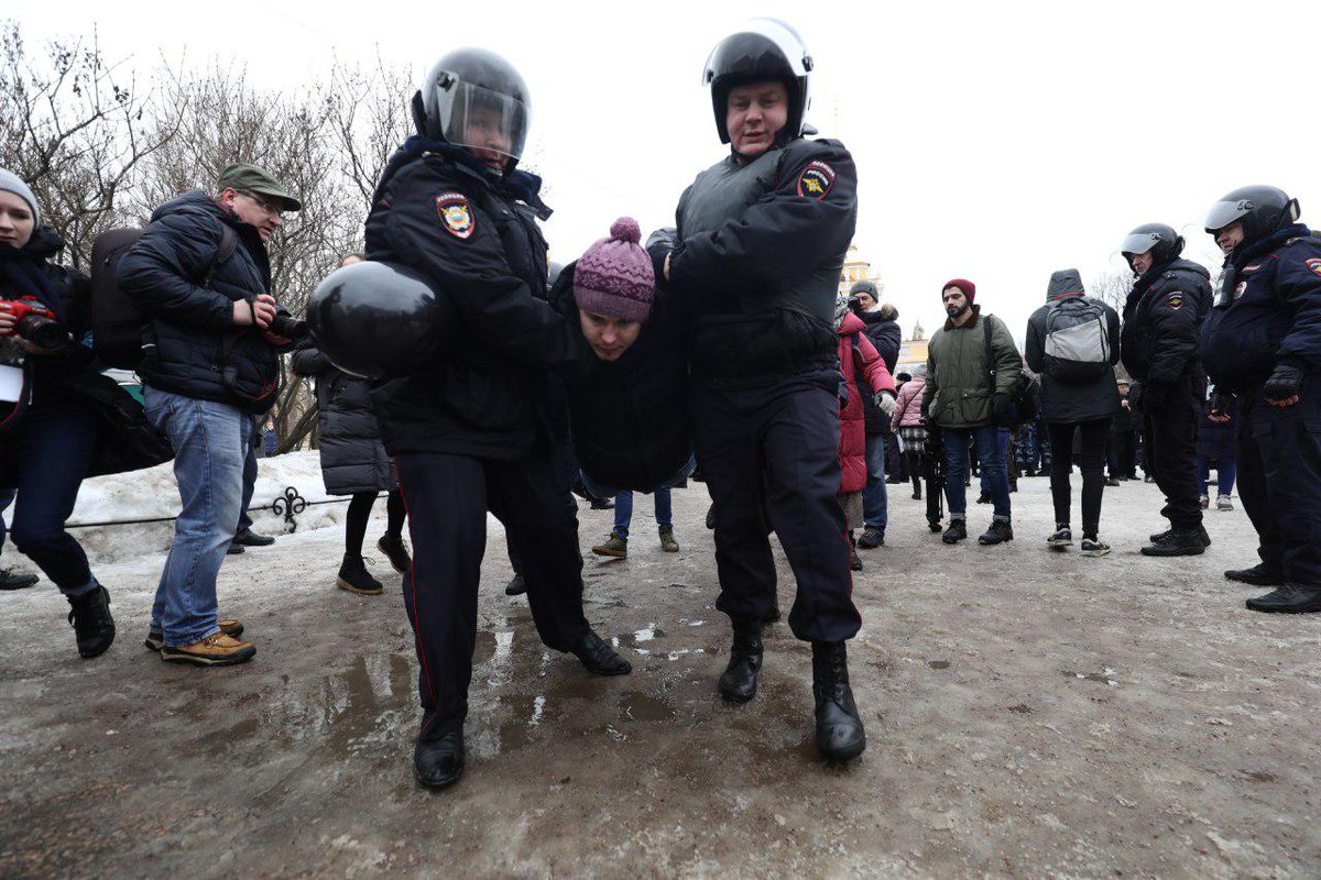 Police detaining protesters at March of Mother's anger in St.Petersburg