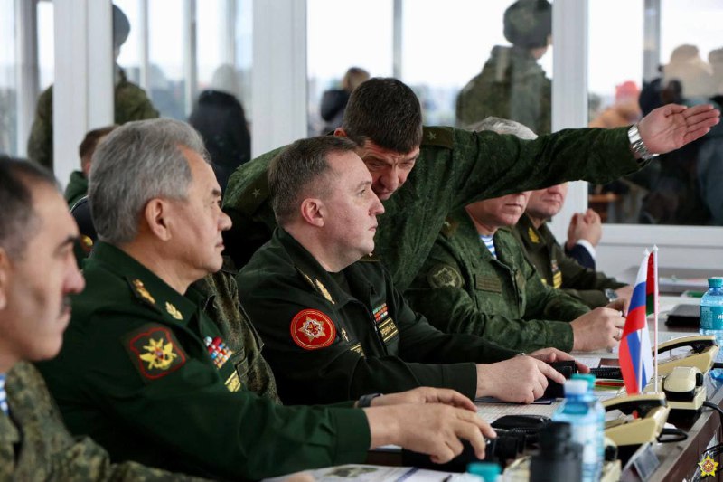 Belarusian and Russian defense ministers at Brestsky firing range watching episode of joint maneuvers