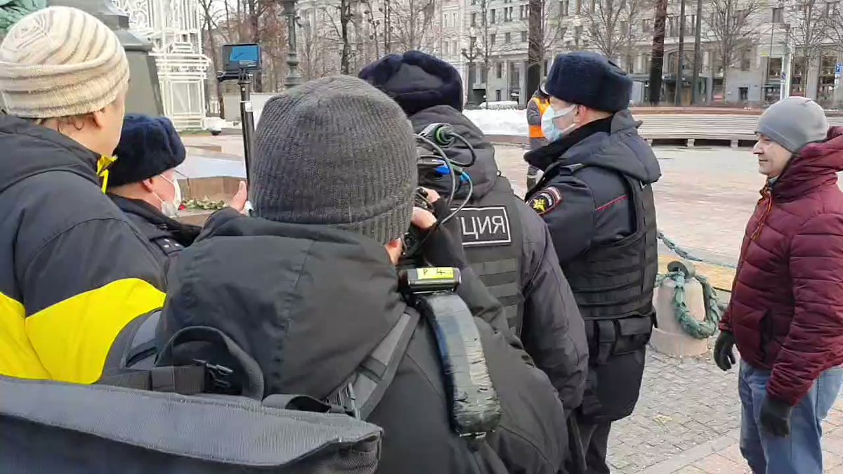 Russia don't touch Ukraine. 6 people unfurled banners against invasion in downtown Moscow. Waiting police immediately arrested them