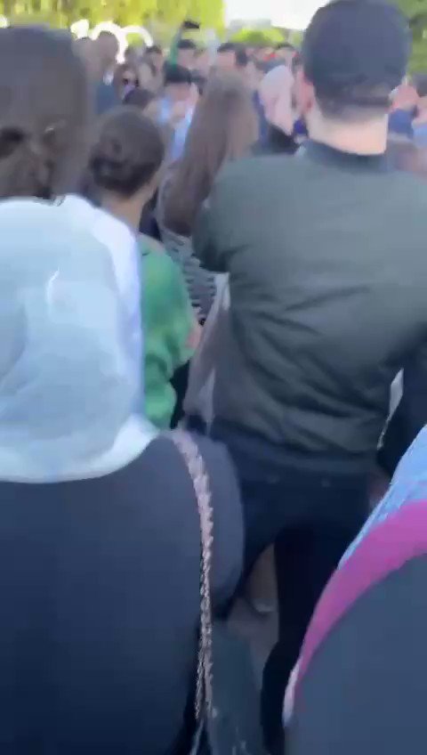 At protest in Nalchik, a woman screams at an official: You send our children there, and then they burn in tanks