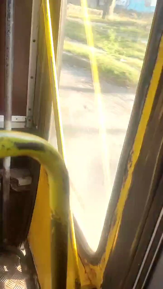 Ukrainian civilians in Kherson riding on a bus film a checkpoint previously occupied by Russian troops and cheer when they realise it's now been abandoned
