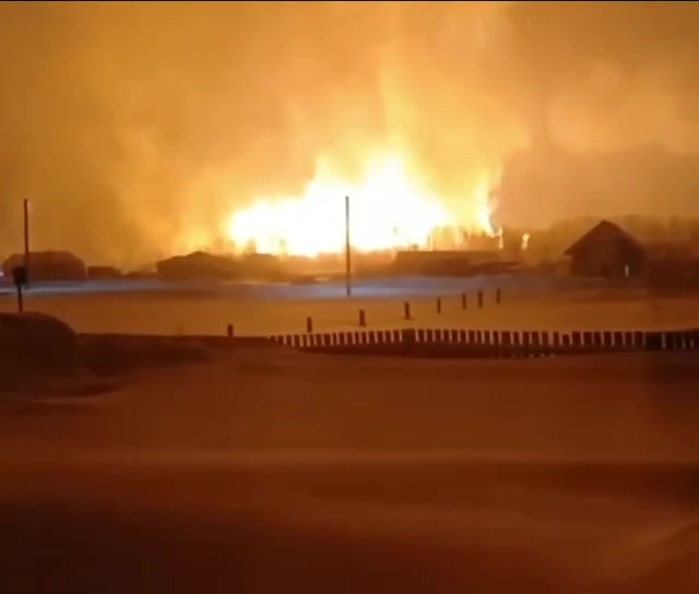 Freight train with fuel caught fire after suspected explosion at natural gas pipeline at Kueda village of Perm region 