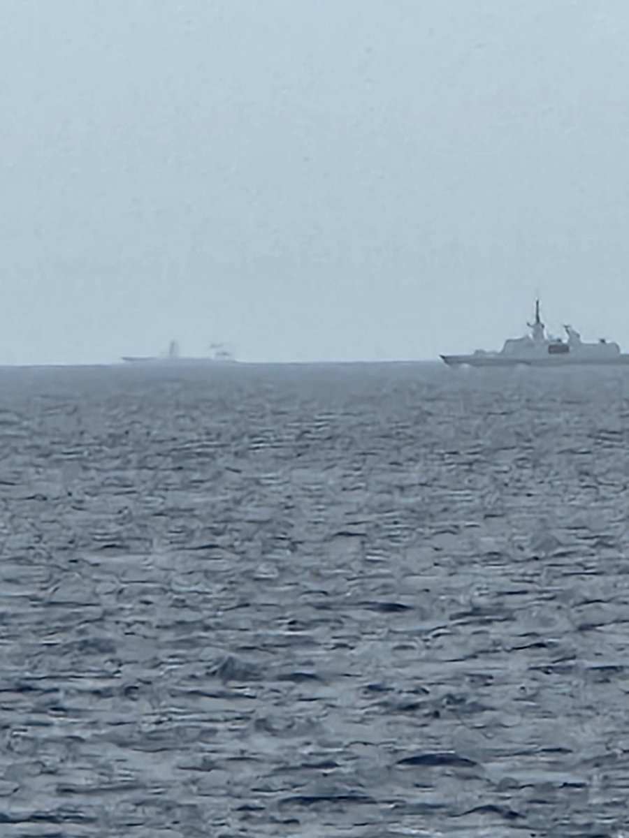 Photo of part of the Russian flotilla and escort as seen from the Celebrity Reflection cruise ship